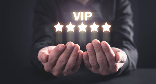 istock Man showing VIP word with five stars. 1145783304