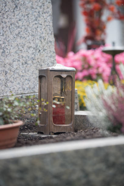 istock Candle / lantern at the cemetery, funeral, sorrow 1145784875