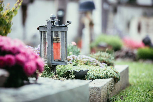istock Candle / lantern at the cemetery, funeral, sorrow 1145785145
