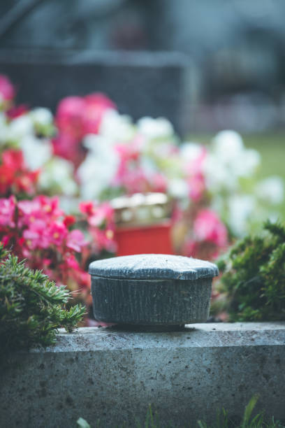 istock Holy water in iron bowl, cemetery 1145785463