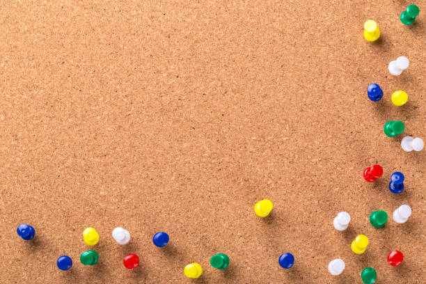 istock Pin board texture for background and colorful pins 1145786703