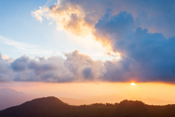 istock colorful dramatic sky with cloud at sunset. 1145797504