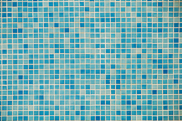 istock Background of square tiles in the pool. 1145799214
