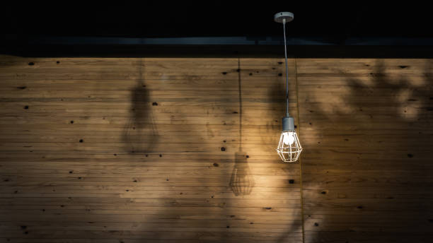 istock Decorative indoor modern lamp hanging on wall and ceiling. 1145799495