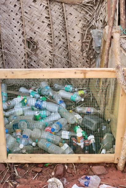 istock Image of rubbish / litter bin, Kerala Backwaters, India 1145799819