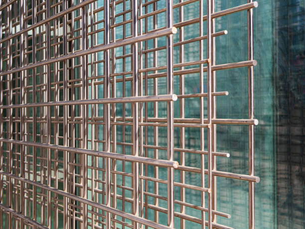 istock Iron wire with glass background for skyscraper building, closeup 1145805342
