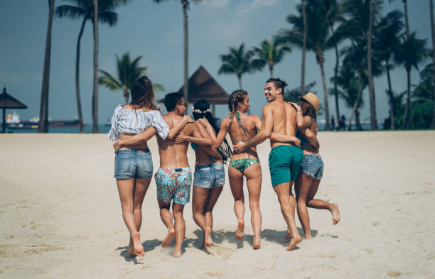 istock Young people on the beach 1145817142