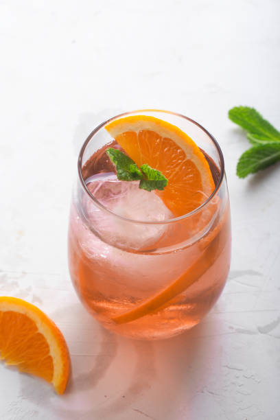 istock Fresh ice tea summer cocktail with orange and ice 1145824146