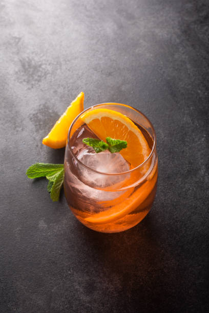 istock Fresh ice tea summer cocktail with orange and ice 1145824161