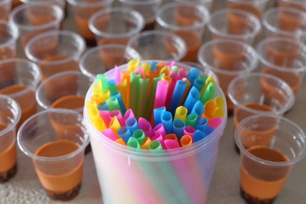 istock Overusing of colorful plastic straw and cup for bubble tea with selective focus 1145831255