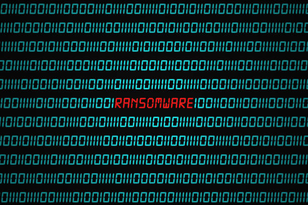 Ransomware attack Red word "Ransomware" hidden in the middle of a binary code sequence. ransomware photos stock pictures, royalty-free photos & images
