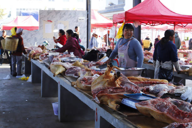 Meat stalls at the Shaxi market in Yunnan, China stock photo
