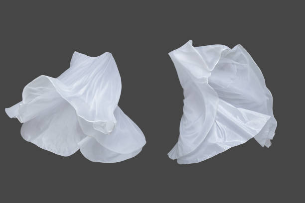 istock Set of white fluttering silk textile over dark gray background 1145832686