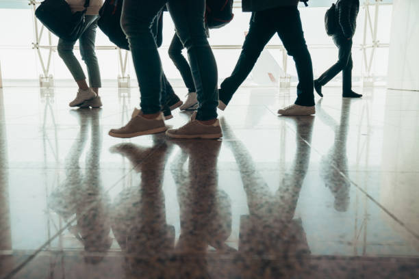 istock Airport with passenger silhouettes 1145832813