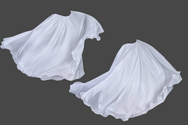 istock Set of white fluttering silk textile over dark gray background 1145832836