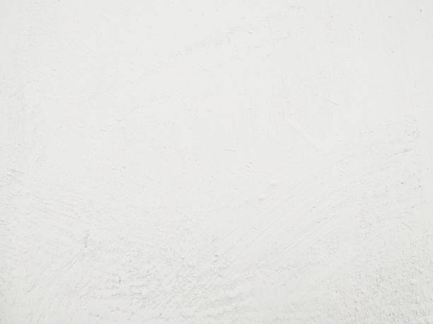 Texture of adobe wall, whitewashing. Abstract background, white color Texture of adobe wall, whitewashing. Abstract background, white color adobe stock pictures, royalty-free photos & images