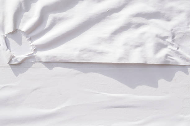 istock White creased poster texture. Abstract background. 1145835446