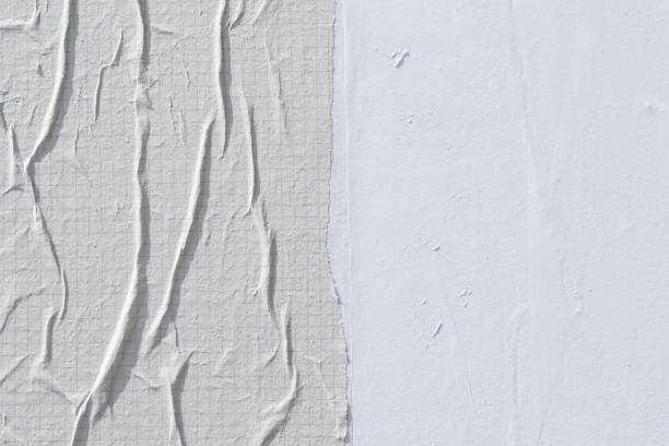 istock White creased poster texture. Abstract background. 1145835491