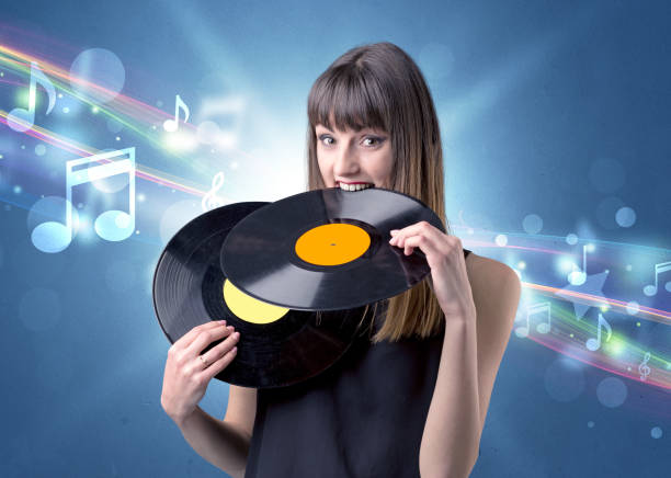 istock Lady holding vinyl record 1145836905