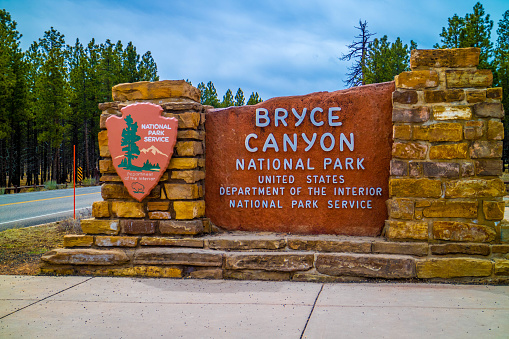 Bryce Canyon National Park, UT, USA - March 25, 2018: A welcoming signboard at the entry point of the preserve park