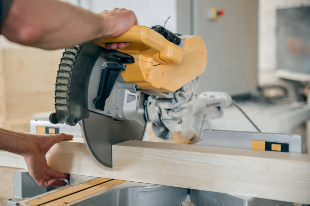 istock Worker cuts a wooden beam circular saw. 1145838078