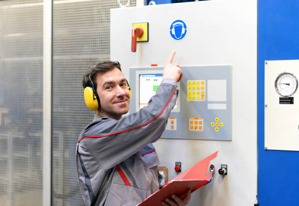 istock industrial safety: workers in an industrial plant with ear protection 1145840578