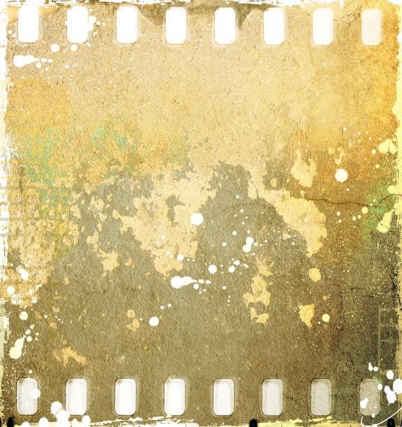 istock Film strip frame with cracked old wall texture. Sepia tones. 1145841934
