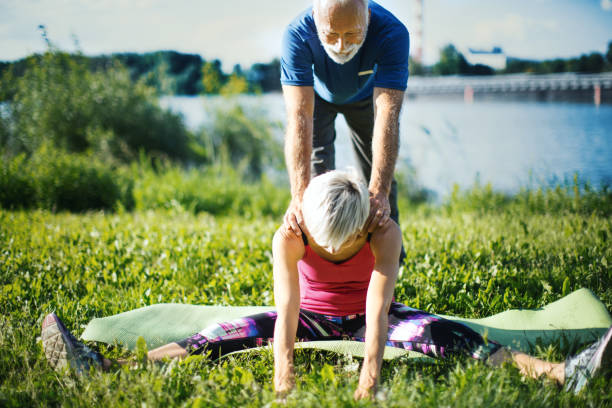 istock Yoga class outdoors. 1145846025