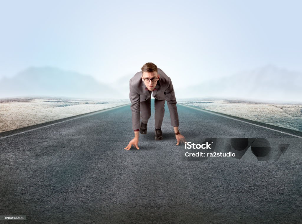 Ready One Position Businessman Kneeling In Ready Position Stock Photo - Download Image Now ...