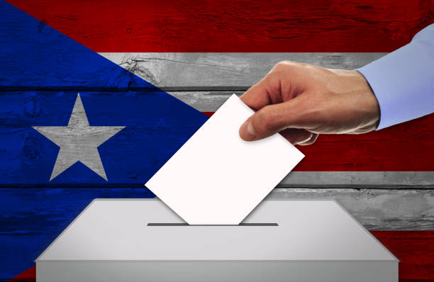 istock Man voting on elections in PUERTO RICO. 1145847980