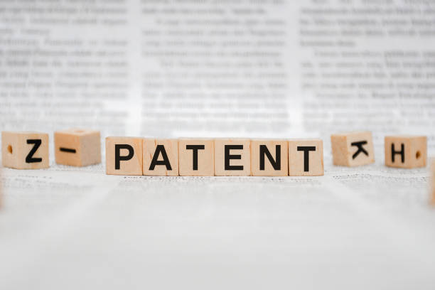 Patent Word Written In Wooden Cube stock photo