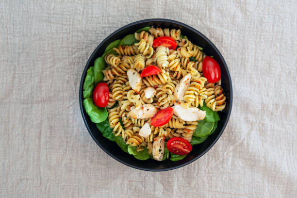 istock fusilli chicken roasted italian cheese with basil and parmesan sauce 1145850454