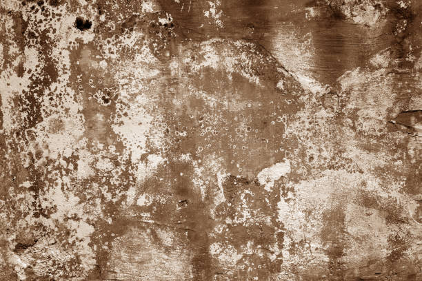 istock Grungy cement wall texture in brown tone. 1145850490