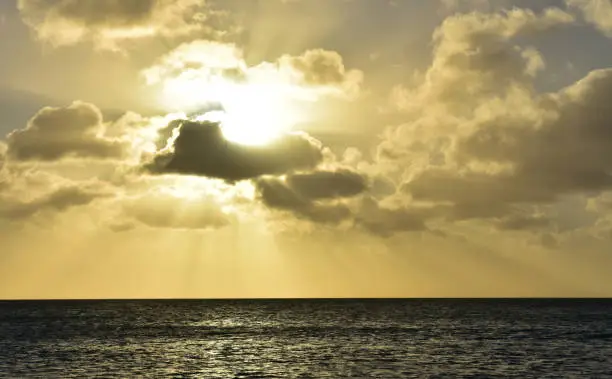 Gorgeous light orange sunset over the ocean in Aruba.