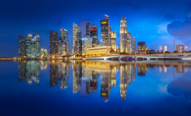 istock Business district and Marina bay in Singapore 1145852637