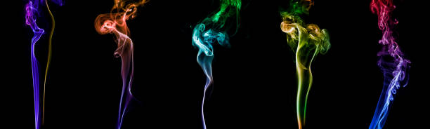 istock Colorful smoke on dark background 1145852696