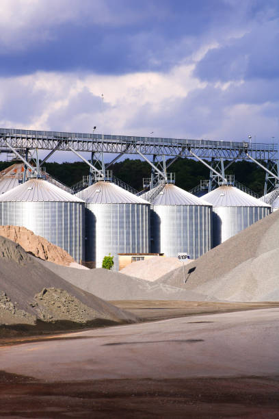istock Metal silo for oil or seed with building elements outside 1145852845