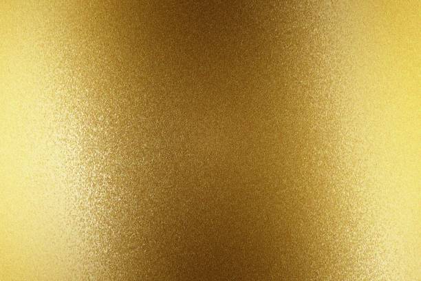 istock Light shining on gold steel wall, abstract texture background 1145855815