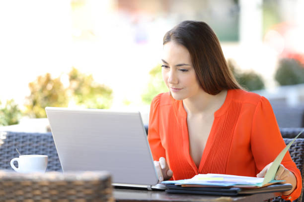istock Serious entrepreneur working online in a coffee shop 1145856212