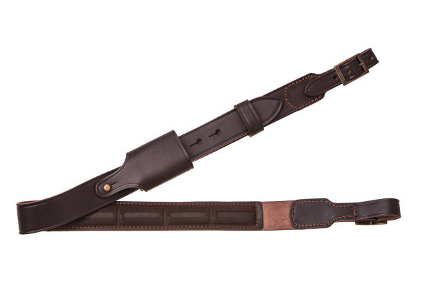 istock leather shoulder strap for a gun isolated on white background 1145861092