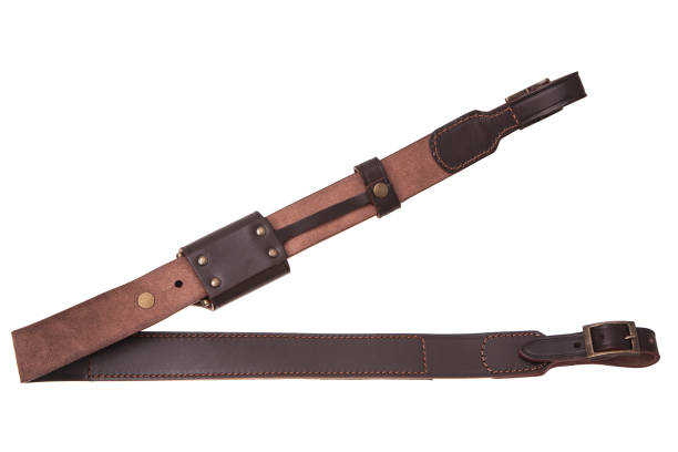 istock leather shoulder strap for a gun isolated on white background 1145861628