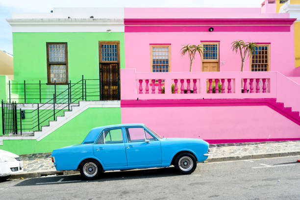 Colorful Bo-Kaap Neighborhood Houses in Cape Town South Africa In Cape Town, South Africa the Bo-Kaap neighborhood has residential homes painted in a variety of bright colors. malay quarter photos stock pictures, royalty-free photos & images