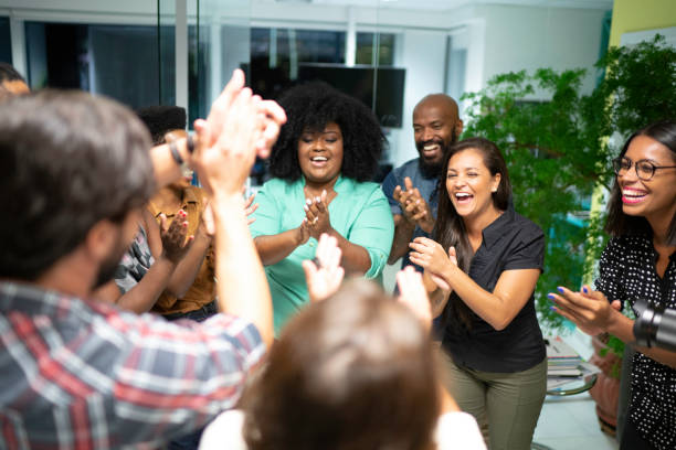 istock Successful business team celebrating in the office 1145863669
