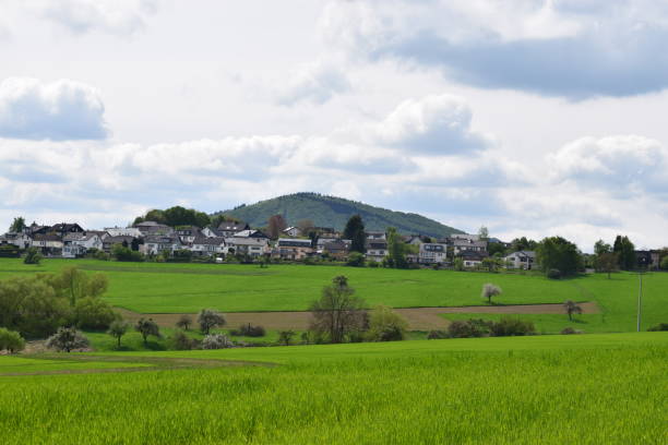 istock village on green hills, Bell (Eifel) 1145863789