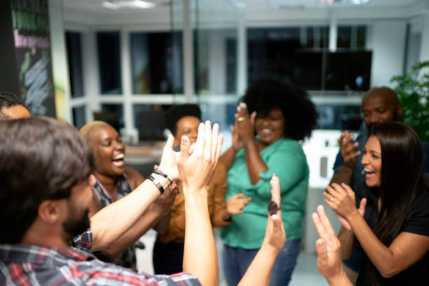 istock Successful business team celebrating in the office 1145868637