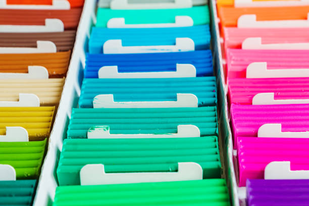 istock Rainbow colors of modeling clay. Multicolored plasticine bars ina box, background texture 1145870143