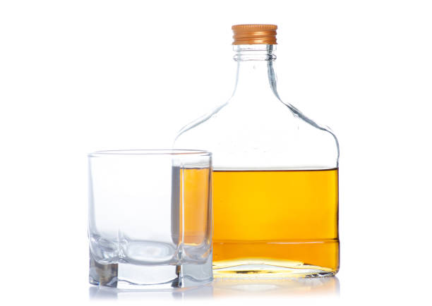 istock Glass with cognac and bottle cognac 1145875136