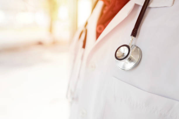 istock Doctor with stethoscope at sunset 1145876945