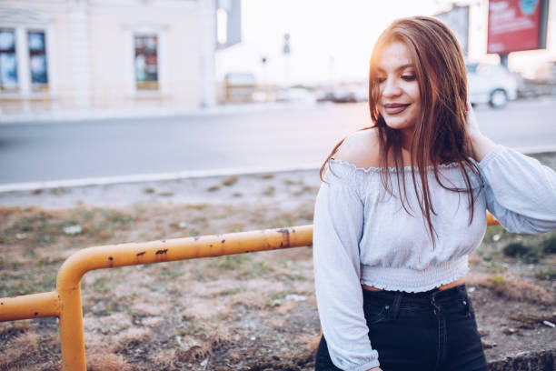 istock Troubled young lady in the city, it's spring time 1145879428