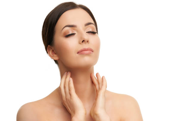 istock Beautiful woman face close up studio on white 1145880556